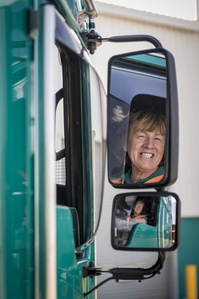 Industrial photography of lady truck driver